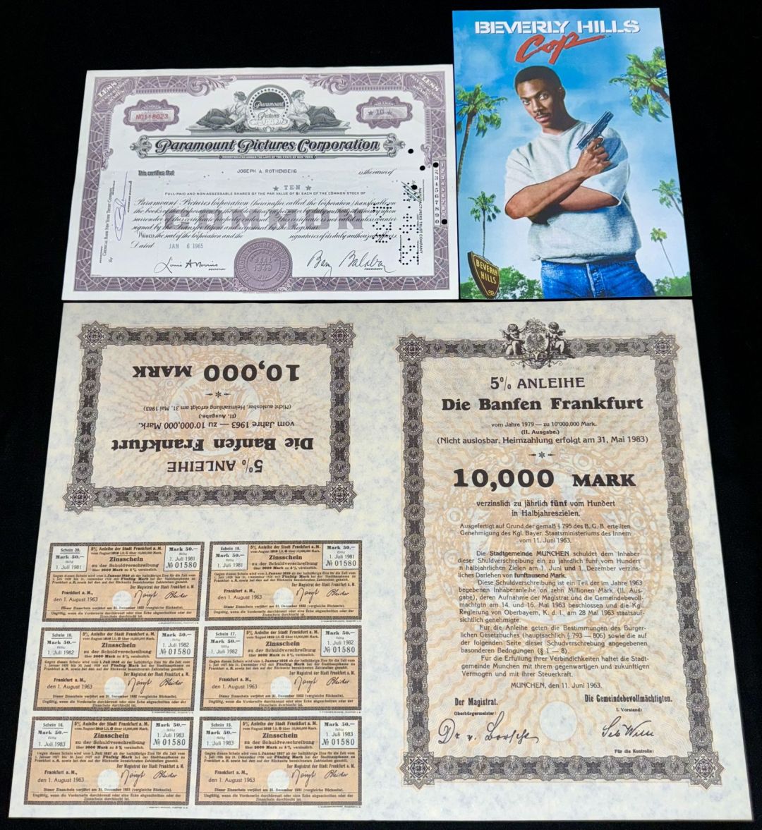 Stock & MOVIE PROP Bond Pair - 1984 Beverly Hills Cop German Bond Printed by Paramount Pictures - For the Famous Action-Comedy Film Starring Eddie Murphy, Judge Reinhold, John Ashton, Ronny Cox, Lisa Eilbacher, Steven Berkoff & Paul Reiser
